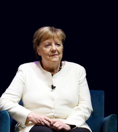Angela Merkel speaking at a political event